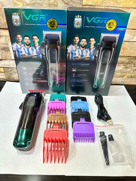 Profesyonel Şarjlı Saç Kesme Makinesi - 200 Dakika Çalışma Süresi, 7000 RPM Motor ve 8'li Tarak Seti